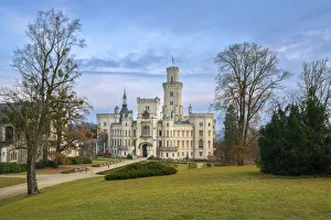 Facade of The State Chateau of Hluboka and its park at dusk, Hluboka nad Vltavou, South Bohemian Region, Czech Republic Facade of The State Chateau of Hluboka and its park at dusk, Hluboka nad Vltavou, South Bohemian Region, Czech Republic