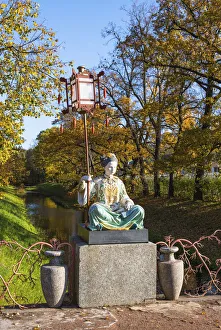 A figure of a Chinese woman on the Large (Grand) Chinese Bridge, Alexander Park A figure of a Chinese woman on the Large (Grand) Chinese Bridge, Alexander Park