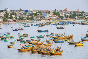 Fishing boats in harbor at Mui Ne, Phan Thiet, Binh Thuan Province, Vietnam Fishing boats in harbor at Mui Ne, Phan Thiet, Binh Thuan Province, Vietnam