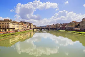 Florence old district on Arno river including Santa Trinita and Ponte Vecchio bridges Florence old district on Arno river including Santa Trinita and Ponte Vecchio bridges