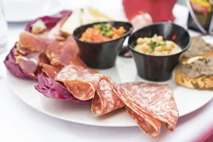 Florence, Tuscany, Italy. Dinner with salame, tomato souce Florence, Tuscany, Italy. Dinner with salame, tomato souce