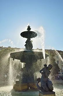 Fountain dating back to 1889, in the centre of the Praca Dom Pedro IV, with mythological Fountain dating back to 1889, in the centre of the Praca Dom Pedro IV, with mythological