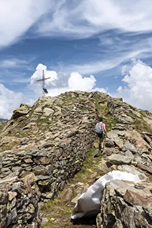 Girl walks inside the defence line of Monte Storile, Grosio, Sondrio Province, Valtellina Girl walks inside the defence line of Monte Storile, Grosio, Sondrio Province, Valtellina