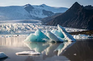 A glacier lagoon with blocks of icebeg, Eastern Iceland, Iceland, Northern Europe A glacier lagoon with blocks of icebeg, Eastern Iceland, Iceland, Northern Europe