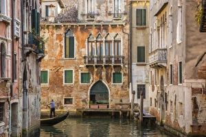 Gondola on canal in Venice, Veneto, Italy Gondola on canal in Venice, Veneto, Italy