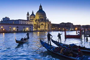 Gondolas and Santa Maria della Salute at dusk. Venice, Veneto, Italy Gondolas and Santa Maria della Salute at dusk. Venice, Veneto, Italy