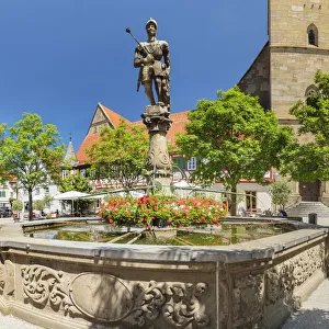 Graf Albrecht fountain at the market square, Mesner Stiftskirche church, Ohringen Graf Albrecht fountain at the market square, Mesner Stiftskirche church, Ohringen