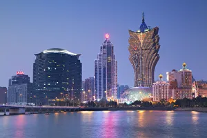 Grand Lisboa Hotel and Casino at dusk, Macau, China Grand Lisboa Hotel and Casino at dusk, Macau, China