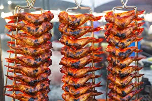 Grilling chicken wings, Night food market, Kota Kinabalu, Sabah, Borneo, Malaysia Grilling chicken wings, Night food market, Kota Kinabalu, Sabah, Borneo, Malaysia
