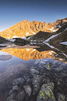 Grom lake at dawn In Stelvio national park, Brescia province, Lombardy district, Italy Grom lake at dawn In Stelvio national park, Brescia province, Lombardy district, Italy