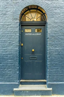 Eleven and a half door number on 18th Century Georgian town houses, Shoreditch, London Eleven and a half door number on 18th Century Georgian town houses, Shoreditch, London