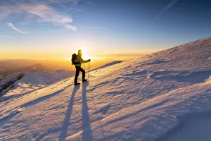 Hiker in Brescia prealpi at dawn, Monte Guglielmo, Brescia provinc, Lombardy District Hiker in Brescia prealpi at dawn, Monte Guglielmo, Brescia provinc, Lombardy District