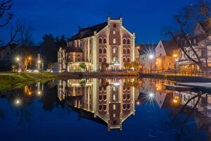 Hotel Budweis reflecting in Malse river at twilight, Ceske Budejovice, South Bohemian Region, Czech Republic Hotel Budweis reflecting in Malse river at twilight, Ceske Budejovice, South Bohemian Region, Czech Republic
