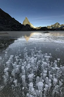 Icy bubbles in Lake Stellisee Zermatt Canton of Valais Pennine Alps Switzerland Icy bubbles in Lake Stellisee Zermatt Canton of Valais Pennine Alps Switzerland