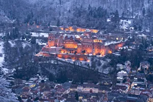 Illuminated Heidelberg castle and old town in winter, Baden-Wurttemberg, Germany