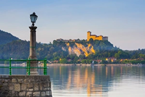 The imposing La Rocca fortress viewd from Arona at sunset, Lake Maggiore, Piedmont, Italy The imposing La Rocca fortress viewd from Arona at sunset, Lake Maggiore, Piedmont, Italy