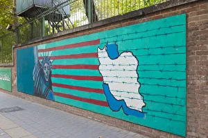 Iran, Tehran, anti-US propaganda mural on the outer walls of the former US embassy Iran, Tehran, anti-US propaganda mural on the outer walls of the former US embassy