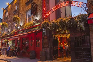 Ireland, Dublin, Temple Bar area, traditional pub exterior, The Temple Bar Pub, dusk Ireland, Dublin, Temple Bar area, traditional pub exterior, The Temple Bar Pub, dusk