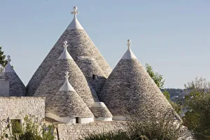 Italy, Apulia (Puglia), Bari district, Itria Valley, traditional trulli rooftops Italy, Apulia (Puglia), Bari district, Itria Valley, traditional trulli rooftops