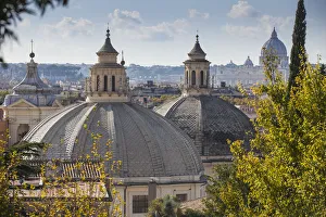 Italy, Lazio, Rome, View over Church domes to St. Peters Basilica Italy, Lazio, Rome, View over Church domes to St. Peters Basilica