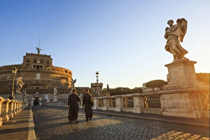 Italy, Rome, two monks walking at Mausoleum of Hadrian (known as Castel Sant'Angelo) Italy, Rome, two monks walking at Mausoleum of Hadrian (known as Castel Sant'Angelo)