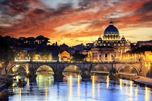 Italy, Rome, St. Peter Basilica by night reflecting on Tevere river Italy, Rome, St. Peter Basilica by night reflecting on Tevere river