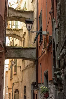 Italy, Tuscany, narrow street with arches in Pontremoli Italy, Tuscany, narrow street with arches in Pontremoli