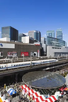 Japan, Honshu, Tokyo, Yurakucho, Skyline and Shinkansen Bullet Train Japan, Honshu, Tokyo, Yurakucho, Skyline and Shinkansen Bullet Train