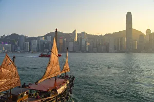 Junk boat in Victoria Harbour, Hong Kong Island, Hong Kong Junk boat in Victoria Harbour, Hong Kong Island, Hong Kong
