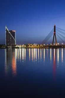 Latvia, Riga, Vansu Bridge, Swedbank building, and Daugava River, evening Latvia, Riga, Vansu Bridge, Swedbank building, and Daugava River, evening