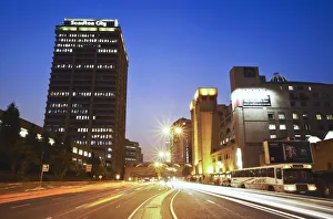 Light trails of traffic passing through downtown Sandton, Johannesburg, Gauteng, South Light trails of traffic passing through downtown Sandton, Johannesburg, Gauteng, South