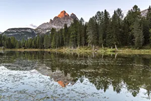 Last lights of the day illuminate the Three Peaks, Antorno Lake, Auronzo di Cadore Last lights of the day illuminate the Three Peaks, Antorno Lake, Auronzo di Cadore