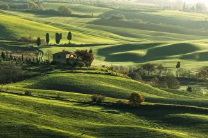 Lone countryhouse immersed in the Siena countryside, Val d'Orcia, Tuscany, Italy Lone countryhouse immersed in the Siena countryside, Val d'Orcia, Tuscany, Italy