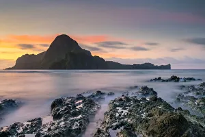 Long exposure of Cadlao Island on Bacuit Bay at sunset seen from Caalan Beach, El Nido Long exposure of Cadlao Island on Bacuit Bay at sunset seen from Caalan Beach, El Nido