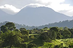 Looming shadow of Volcan Baru overlooking Rain Forest below, Panama, Central America Looming shadow of Volcan Baru overlooking Rain Forest below, Panama, Central America