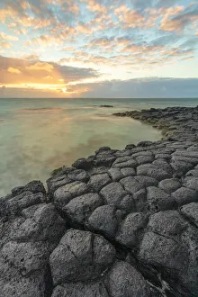 a magical sunrise whit basaltic stone, Trou d'Eau Douce, Mauritius, Indian Ocean a magical sunrise whit basaltic stone, Trou d'Eau Douce, Mauritius, Indian Ocean