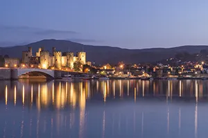 Majestic ruins of Conwy Castle in evening light, Snowdonia National Park, Wales, UK Majestic ruins of Conwy Castle in evening light, Snowdonia National Park, Wales, UK