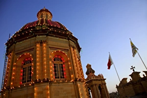 Malta, Vittoriosa; Church cupola at Vittoriosa decorated for the feast of patron Saint Lawrence Malta, Vittoriosa; Church cupola at Vittoriosa decorated for the feast of patron Saint Lawrence