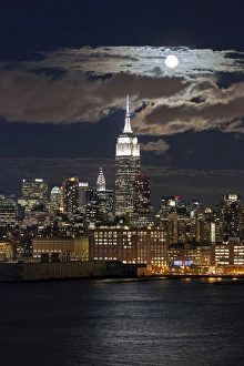 Manhattan, Moonrise over the Empire State Building and Midtown Manhattan looking Manhattan, Moonrise over the Empire State Building and Midtown Manhattan looking
