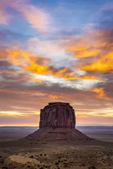 Merrick Butte against colourful cloudy sky at sunrise, Monument Valley, Arizona, USA Merrick Butte against colourful cloudy sky at sunrise, Monument Valley, Arizona, USA