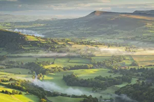Mist shrouded rolling countryside in the Brecon Beacons National Park, Powys, Wales, UK Mist shrouded rolling countryside in the Brecon Beacons National Park, Powys, Wales, UK