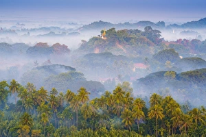 Mrauk-U, Rakhine state, Myanmar. Mrauk-U valley in a foggy sunrise seen from the Mrauk-U, Rakhine state, Myanmar. Mrauk-U valley in a foggy sunrise seen from the
