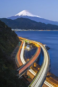 Mt. Fuji and traffic driving on the Tomei Expressway, Shizuoka, Honshu, Japan Mt. Fuji and traffic driving on the Tomei Expressway, Shizuoka, Honshu, Japan