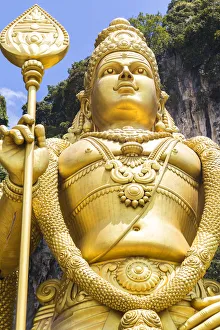 Murugan statue at the Batu Caves, Hindu religous site, Kuala Lumpur, Malaysia Hindu Murugan statue at the Batu Caves, Hindu religous site, Kuala Lumpur, Malaysia Hindu