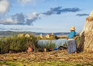 Native Uro Lady, Uros Floating Islands, Lake Titicaca, Puno Region, Peru Native Uro Lady, Uros Floating Islands, Lake Titicaca, Puno Region, Peru