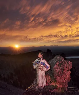 Native woman, Acosia M. Red Elk, in historic buckskin dress on top of Paulina Peak Native woman, Acosia M. Red Elk, in historic buckskin dress on top of Paulina Peak