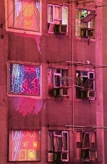 The neon lights of Kowloon reflected in the windows The neon lights of Kowloon reflected in the windows