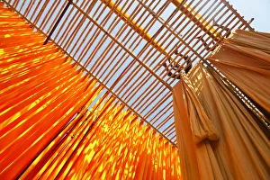 Newly dyed fabric being hung up to dry, Sari garment factory, Rajasthan, India, (MR/PR) Newly dyed fabric being hung up to dry, Sari garment factory, Rajasthan, India, (MR/PR)
