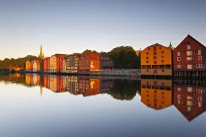 Nidaros Cathedral & Gamle Bybro illuminated at sunrise, Trondheim, Sor-Trondelag, Norway Nidaros Cathedral & Gamle Bybro illuminated at sunrise, Trondheim, Sor-Trondelag, Norway