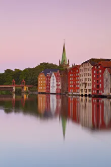 Nidaros Cathedral & Gamle Bybro illuminated at dawn, Trondheim, Sor-Trondelag, Norway Nidaros Cathedral & Gamle Bybro illuminated at dawn, Trondheim, Sor-Trondelag, Norway